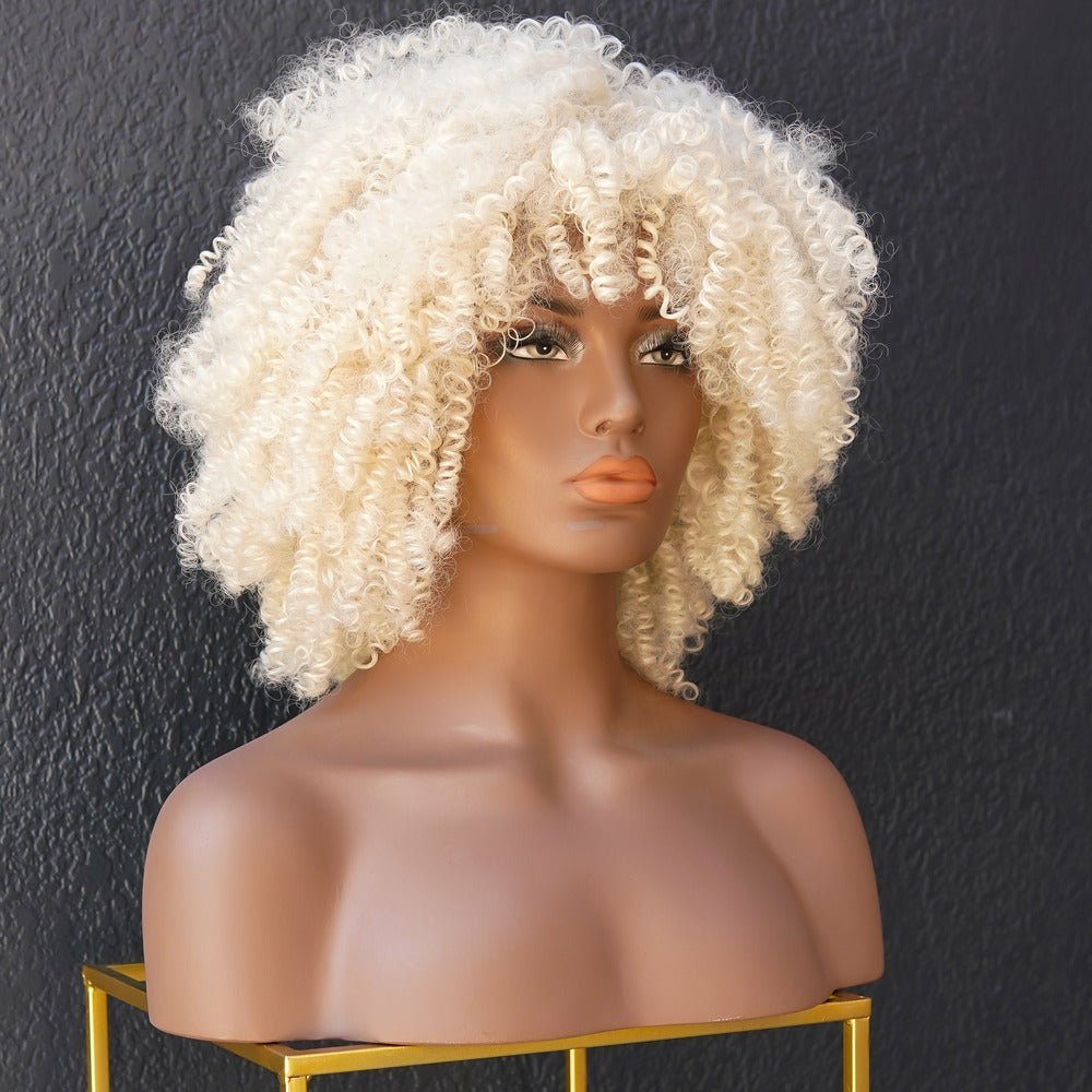 JAYDA - Blonde - Afro Curl Wig | Blonde, 14 Inch, Fringe, Synthetic Hair | Milk &amp; Honey Wigs