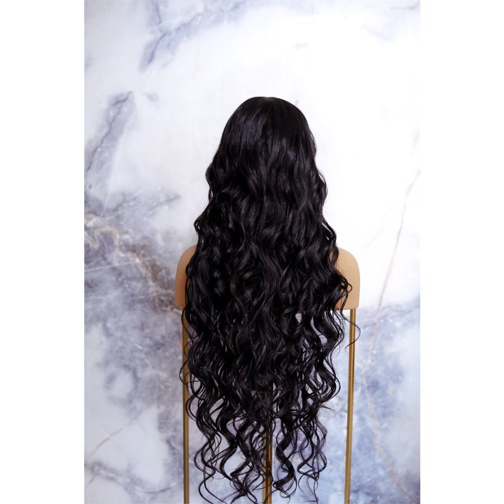 KEHLANI black synthetic beach curl lace front wig | Milk &amp; Honey Wigs